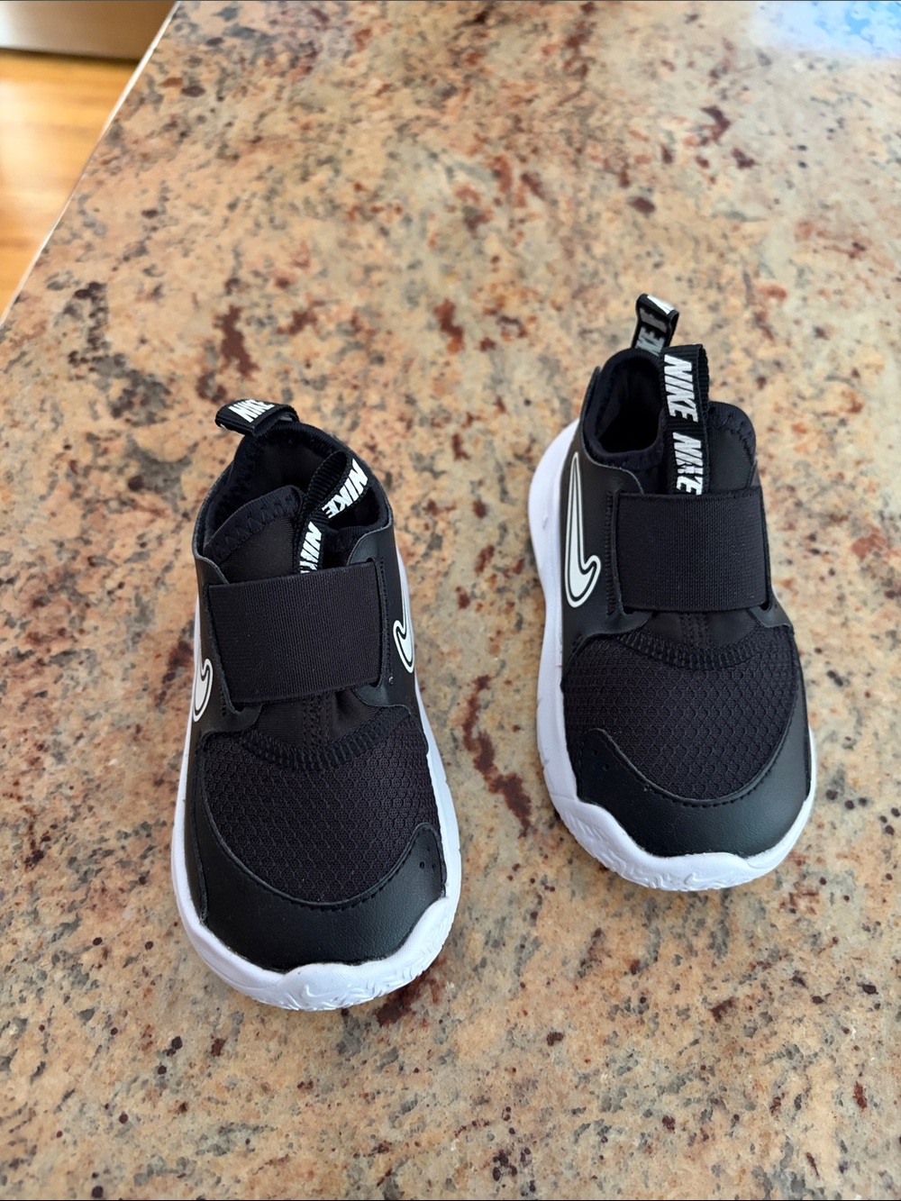 Nike Kids Black and White Slip-On Sneakers with Hook-and-Loop Strap